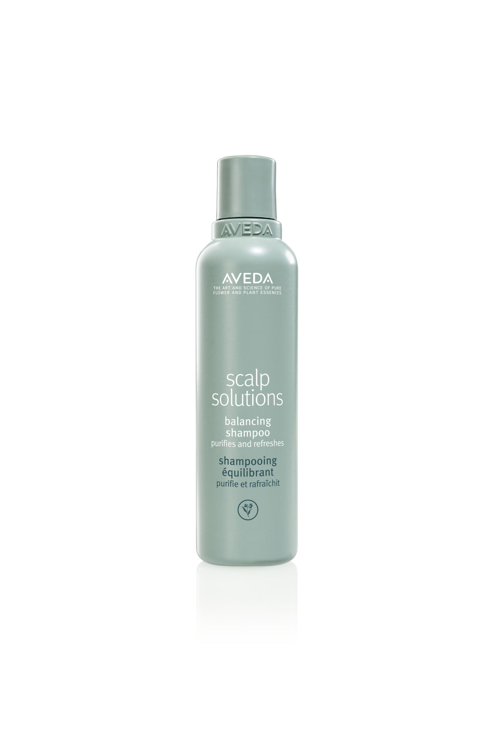 A silver bottle of Aveda Scalp Solutions Balancing Shampoo with text indicating it purifies and refreshes. - True Blue Salon | Nashville, TN